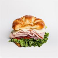 20. Turkey Sandwich Croissant · Includes mayo, mustard, lettuce, tomato, red onion, and cheese.
