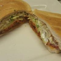 Torta de Res/ Steak · Comes with beans, lettuce, tomato, onion, avocado, and sour cream. Jalapeno upon request./ C...