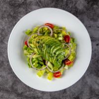 Avocado Salad · mix green , avocado, cucumbers, red onions, tomatoes, lemon and olive oil.