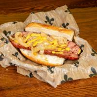 Smoked Sausage Dawg · 1/2 lb. smoked sausage dog served on a french roll with mustard & grilled onions.