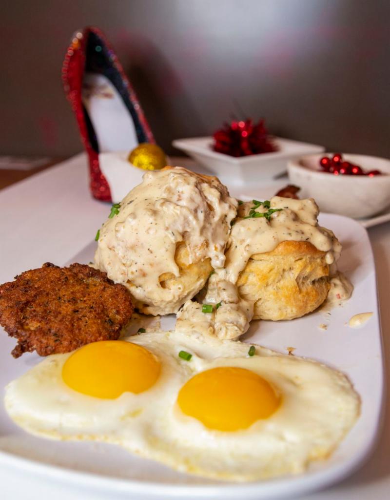 Biscuits & Gravy · Two buttermilk biscuits covered in Swaggerty's Country Sausage Gravy, served with two eggs any style, fried green tomato and applewood-smoked bacon