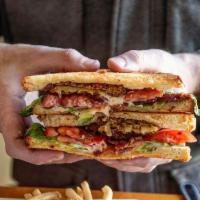 Southern BLT · Fried green & fresh red tomatoes, lettuce, applewood-smoked bacon and mayo on toasted Brioch...