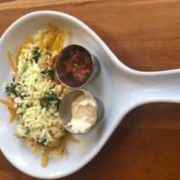 Skinny Migas (Veg) · A Tex-mex eggwhite scramble with spinach, pico de gallo and pepperjack cheese over crispy to...