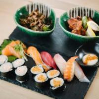 NHB Box Dinner A · 4pc Red Crab maki, 4pc spicy tuna maki, 3pc salmon sashimi, 1pc maguro nigiri, 1pc salmon ni...