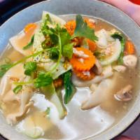 Chicken Wonton Soup · Handmade chicken breast wonton, bok choy, carrot, cabbage, mushroom, cilantro, and green oni...