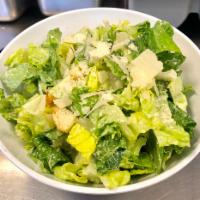 Roman Caesar Salad · Romaine hearts, shaved parmesan, croutons and house Caesar dressing.