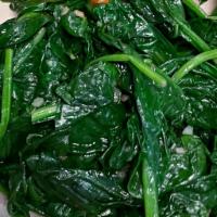 Sauteed Spinach · Organic spinach sauteed with light garlic in olive oil