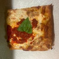 Grandma Pizza Slice · Marinara, fresh mozzarella and basil pie.