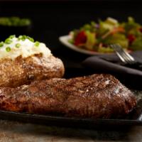 14 oz. Rib Eye Steak · Well-marbled, tender, juicy and delicious. Choice of side included.