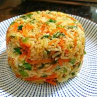 Vegetable Fried Rice 菜炒饭 · Stir fried rice with veggies.