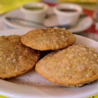 Daal Puri ~ 2 pieces · Bangladeshi mini flatbread with lentils inside.  Served with tamarind and mint sauce on the ...