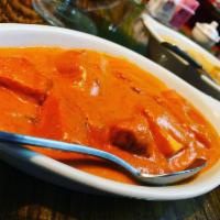 Mixed Tikka Masala · Boneless white meat Chicken, cubed Lamb, peeled Shrimp marinated in 'Tondoori sauce' made wi...