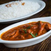 Butter Chicken Makhani · Butter chicken. Boneless white meat sliced Chicken Tikka cooked in a chef's special buttery ...