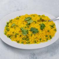 Peas Polao · Baash-moti Rice prepared with  green peas, grilled onion, turmeric and other spices.