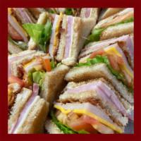 Club Sandwich · Ham, turkey, bacon, lettuce, tomatoes, Swiss cheese, American cheese and mayo.
