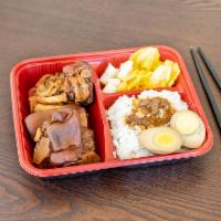 Hock Spices Bento Rice 五香豬腳飯便當 · 4 pcs. pork hock, 1 pc. braised egg, 2 oz. kimchi, and pickle, 9 oz. rice, loba sauce.