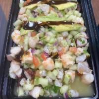 Ceviche Criminal  · Shrimp cooked in lime juice, cooked shrimp, octopus, scallop mixed , onion, cucumber tomato ...