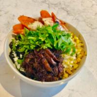Lamb Barbacoa Rice Bowl · Roasted Carrots, Grilled Corn, Black Beans, Habanero Mayo, Cilantro, Red Rice.