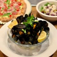 Zuppa Di Cozze · Sauteed mussels in garlic oil or tomato sauce.