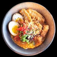 Spicy Miso Chicken & Potsticker Ramen 🌶 · Crispy potstickers, fried chicken, soy egg, spicy miso, green onion, pickled ginger shoga, c...