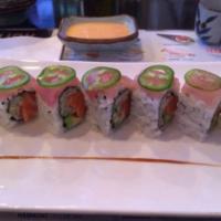 Daredevil Roll · Salmon, avocado and cucumber and topped with yellowtail and jalapeno.