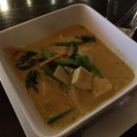 Panang Curry · Sweet and medium spicy with bell peppers, basil, carrots, bamboo, string beans. Served with ...