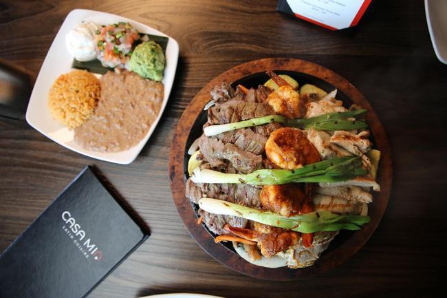 Sizzling Fajitas for Two · Sizzling Fajitas, served with Chicken and Skirt steak, Spanish rice, beans, guacamole and sour cream
TRIO includes: Skirt steak, chicken and Shrimp