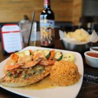 Tilapia al Blanco · Pan seared tilapia topped with a velvety white butter wine sauce served with three sautèed s...