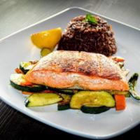Grilled Salmon · Spice rubbed salmon served with gallo pinto and sautèed vegetables