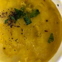 Dahl Soup · Yellow mung beans, masala, ginger, garlic and onion. Vegan.