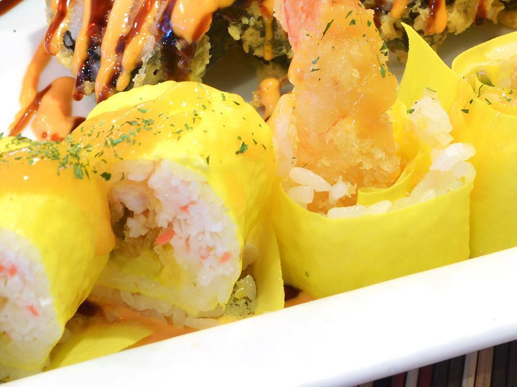 Shrimp Tempura Roll · Shrimp tempura, cucumber, and avocado with eel sauce.