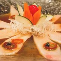 Yellowtail Jalapeno · Sliced yellowtail with jalapeno. Served with caper sauce.