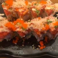 18. Manhattan Roll · Shrimp tempura and crab stick topped with spicy crunchy tuna and fish roe.
