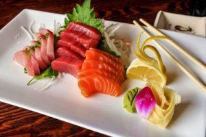 Trio Sashimi · 6 pieces each of tuna, salmon, yellowtail and sashimi.