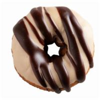 Peanut Butter In Paradise · Peanut butter icing with chocolate drizzle