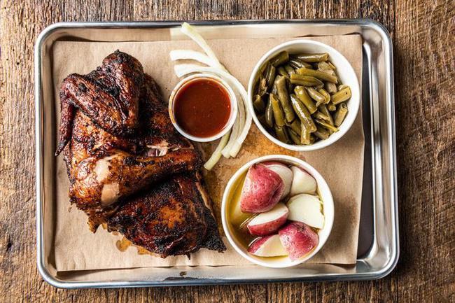 HALF CHICKEN PLATE · Half a smoked chicken with choice of 2 sides.