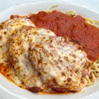 Chicken Parmesan · Lightly breaded chicken breasts, melted mozzarella, served with a side of linguine with mari...