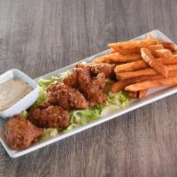 Chicken Wings · 5 chicken wings served with fries. With your choice of blue cheese dressing, ranch dressing,...