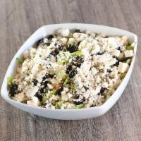 Greek Salad · Lettuce, cucumbers, tomatoes, mint, feta cheese, and black olives tossed with a Greek style ...