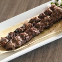 Beef Kabob Plate · 2 seasoned ground beef skewers (Kofta) . Add sauce for an additional charge.
Served with one...