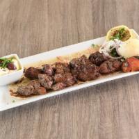 Beef Tikka Plate · 2 skewers of tender marinated beef medallions. 
Add sauce for an additional charge.
Served w...