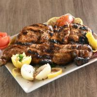 Whole Char Grilled Chicken · Iraqi style marinated chicken grilled over charcoal. Please allow 25 minutes for grilling. C...