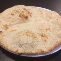 Sesame Bread · Traditional Arabic flatbread with sesame.