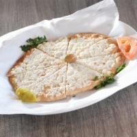 Jibin (cheese pie) · Creamy cheese filling baked onto dough. Cheese pie. Add sauce for an additional charge.