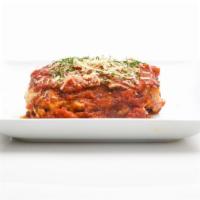 Homemade Beef Lasagna · Made with ground and seasoned beef and a blend of Romano, ricotta and mozzarella cheeses and...