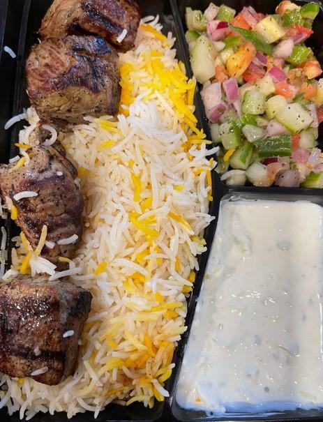 KABOB BOX · Hearty Meal Box with your favorite kabob and sides. Includes Saffron rice, taziki, shirazi salad, one kabab skewer