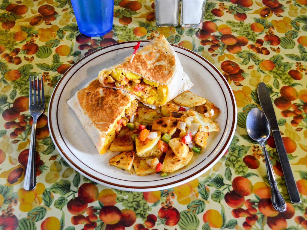 Breakfast Burrito · A large tortilla stuffed with ham, sausage, or bacon, egg, chili pepper, salsa, and cheese. Served with hash brown, country potatoes, or fresh fruit.