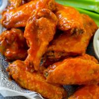 Buffalo Wings · 6 assorted pieces, tossed in hot sauce, choose ranch or blue cheese to dip.