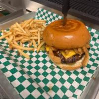 Signature Burger · 1/2 lb. beef patty or a grilled chicken breast, lettuce, tomato, pickles, red onion, and che...