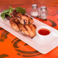 Thai BBQ Chicken · Grilled marinated half lemongrass chicken served with sweet chili sauce. Served with choice ...